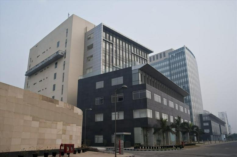 Exterior view of the modern multi-story Block 2 building at Sohna Road, Gurugram.
