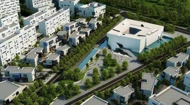 Aerial exterior view of the modern white Building 2, Wuhan Creativity World with surrounding greenery and water.