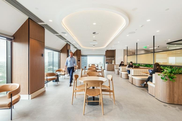 Spacious communal lounge at Level 30, Collins Place, 35 Collins Street, Melbourne, Victoria with wooden accents.