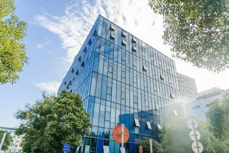 Exterior view of the glass-facade building at Commercial Center, Wuhan Creativity World, Phase I.