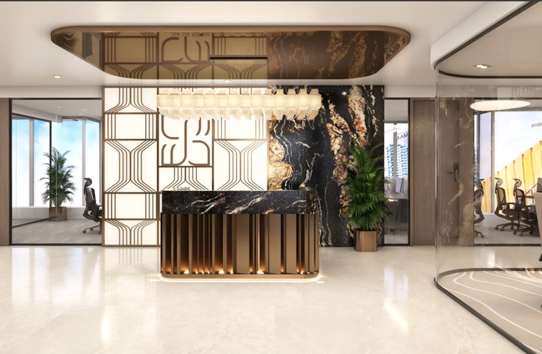 Luxurious reception desk at Emaar Square, Downtown, Dubai featuring gold accents and marble textures.