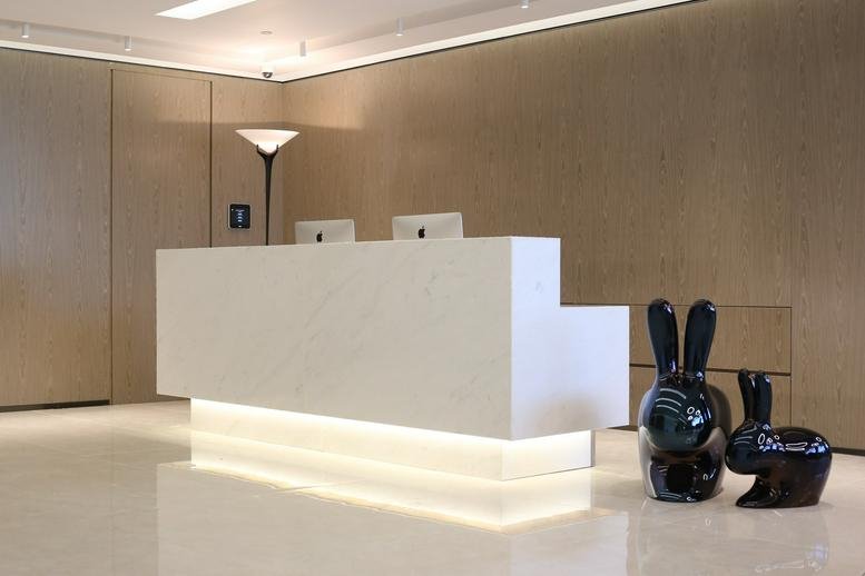 Sleek modern reception area at Great Eagle Centre, 23 Harbour Road, Wanchai North, Hong Kong.