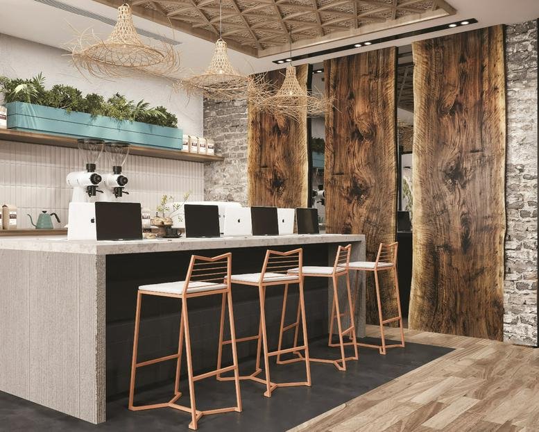 Communal workspace with wooden partitions and bar seating.