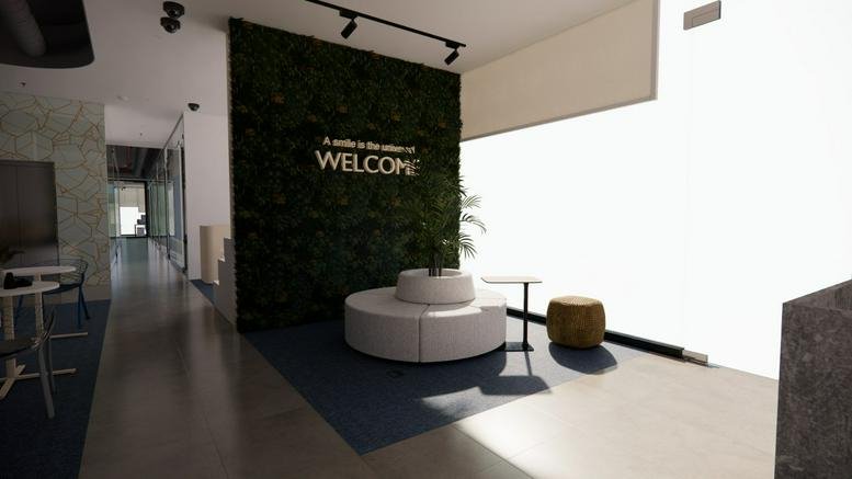 Spacious reception area at Imam Saud Bin Faisal Road, Almalqa Area featuring a green living wall and circular seating.