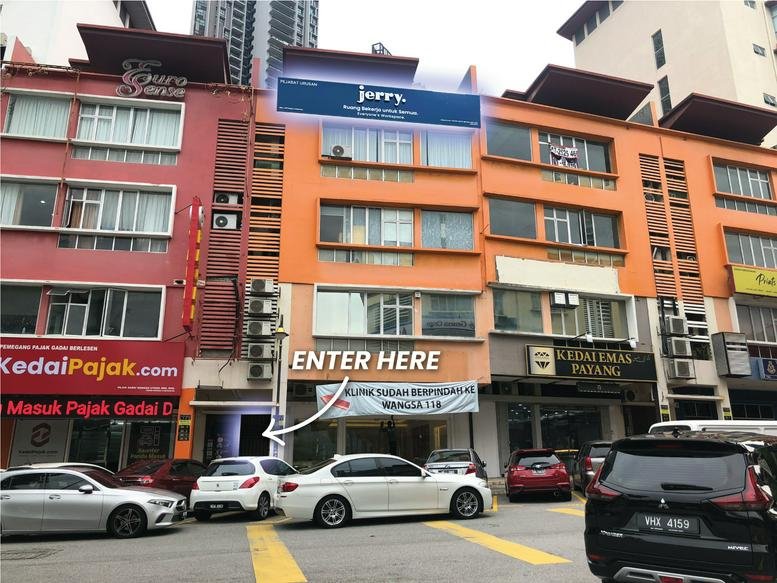 Exterior view of the orange and red building at Unit No. 6-3, Jalan Wangsa Delima 10.