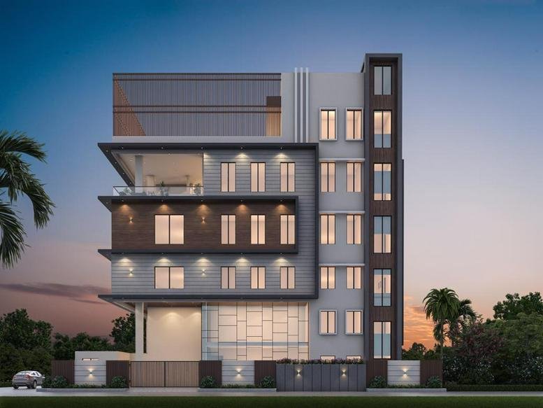 Modern multi-story office building at dusk with illuminated windows and a sleek facade.