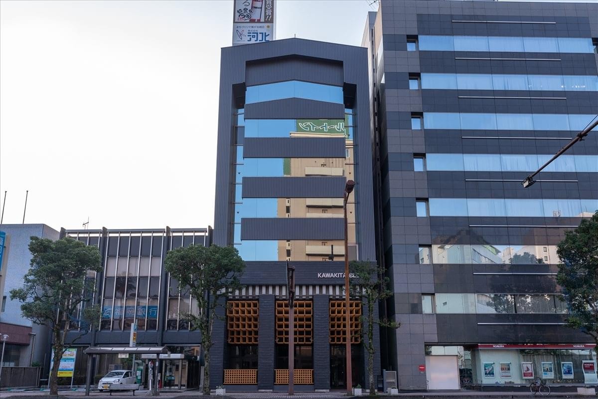 Street-level view of the Kawakita Building 1F 2F office entrance in Miyazaki city.