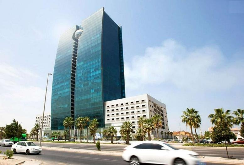 Exterior view of the blue glass skyscraper at King Abdul Aziz Road, Ash Shati.