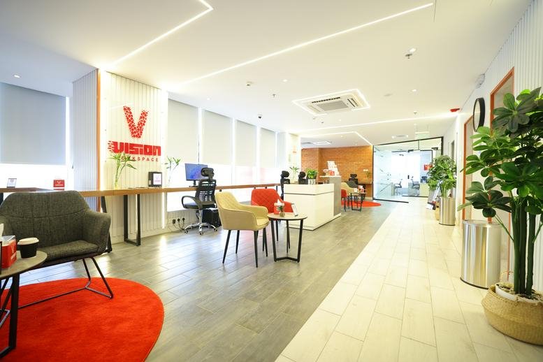 Spacious reception area at King Abdul Aziz Road, Ash Shati with a branded wall and seating.
