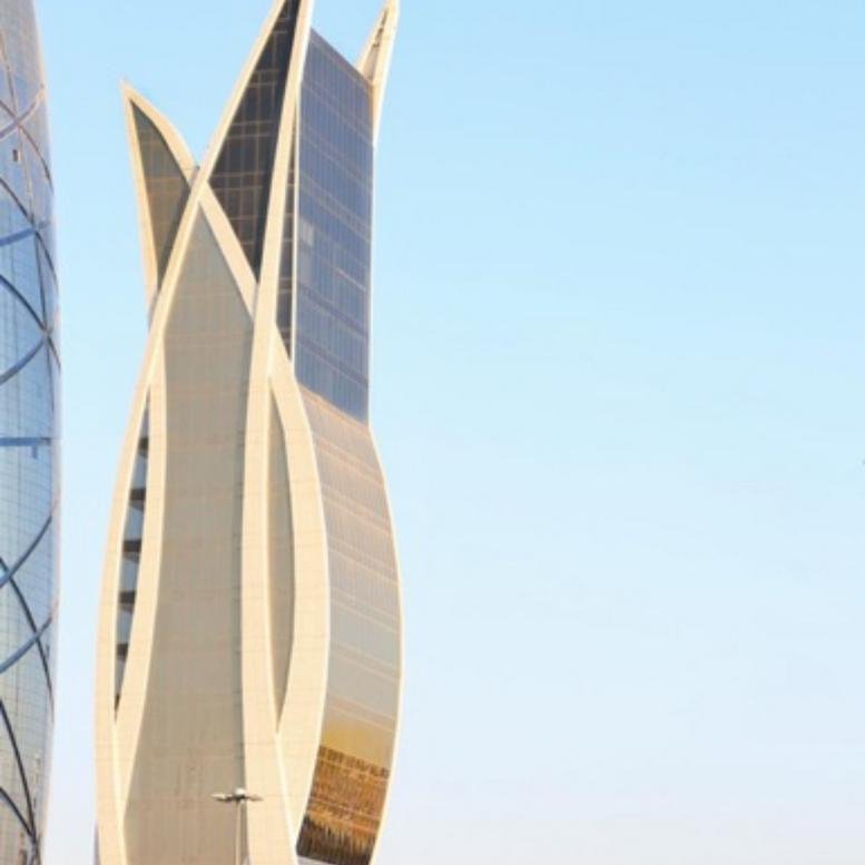 Exterior view of the striking sail-shaped skyscraper at King Fahd Branch Road, Alyasmin.
