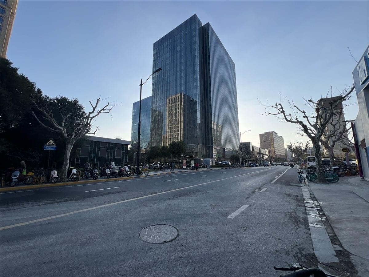 Exterior view of the glass-facade Building 1 at Lane 339, Tongpu Road.