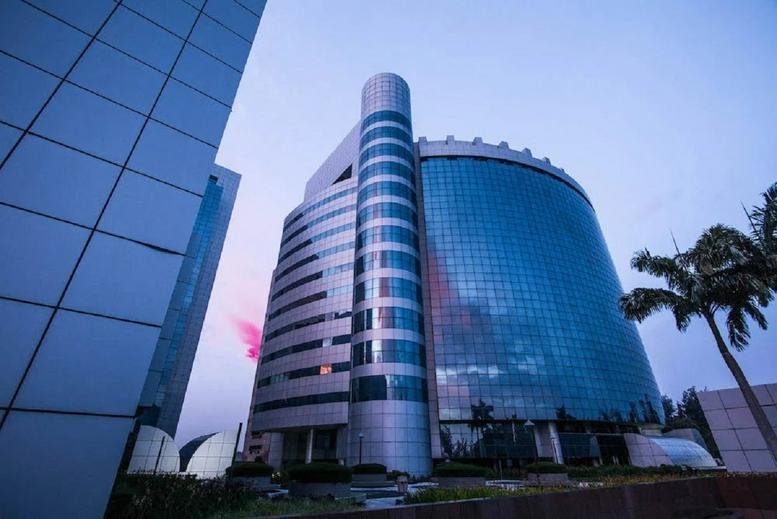 Exterior view of the glass-facade Main Office Tower at Jalan Merdeka.