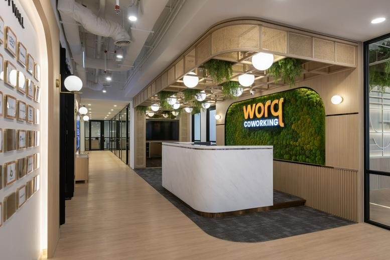 Reception and lobby area at Menara Shell, 211, Jalan Tun Sambanthan, Kuala Lumpur with a lush green moss feature wall.