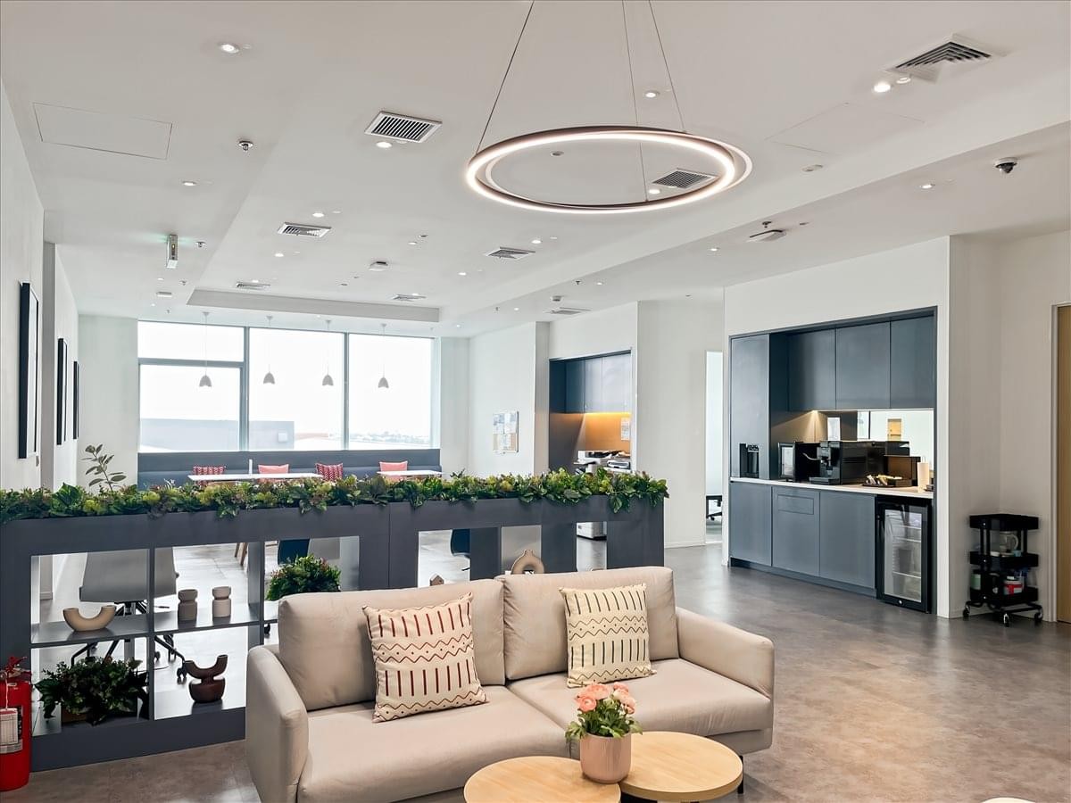 Spacious lounge at WHA Tower with comfortable seating and sleek modern finishes.