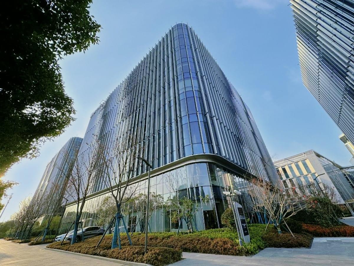 Exterior view of the curved glass-facade 9/F BU Center, T2 Building.