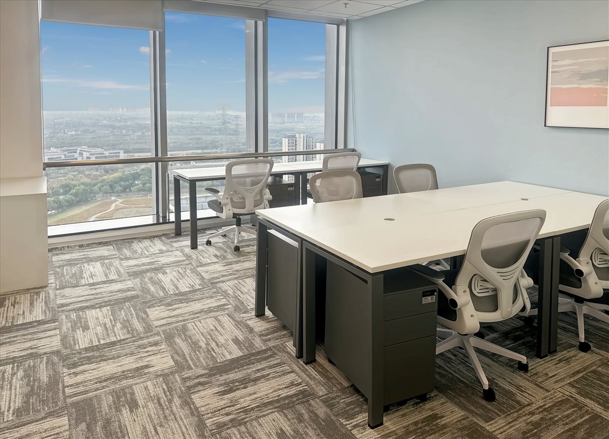 Private office with large windows overlooking the city at Building 1, Tongxiang.