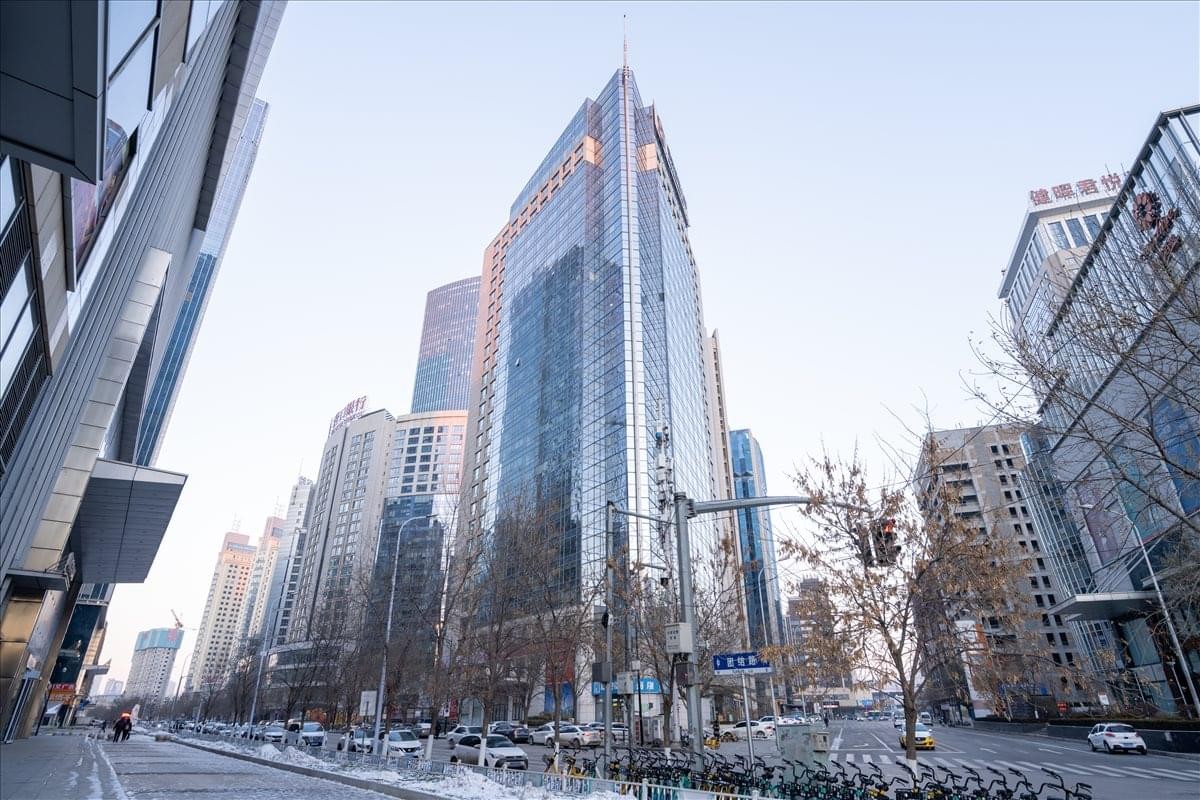 Exterior view of the glass-facade skyscraper at No. 59, Beizhan Road, Shenhe District.