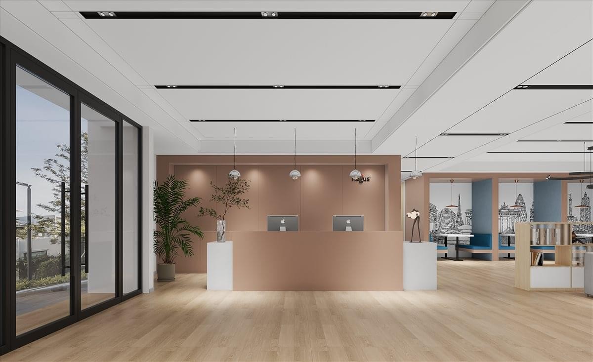 Modern reception desk at the Reeb Building featuring warm wood tones and a minimalist design.