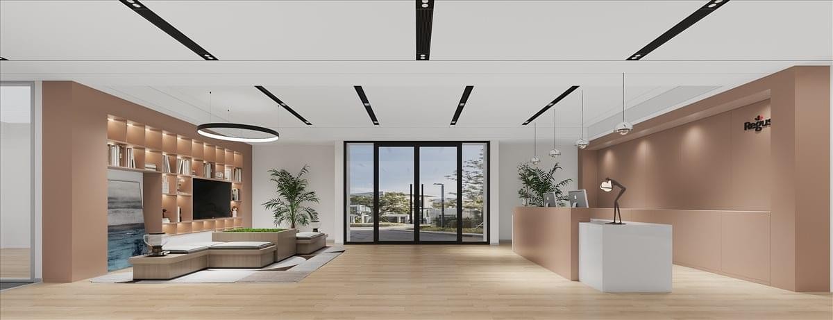 Large lounge and reception area with warm wood-panelled walls and modern furniture.