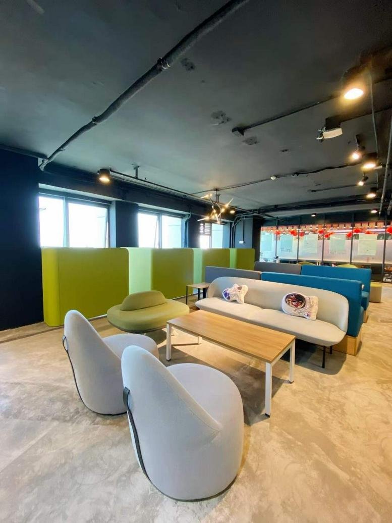 Spacious communal lounge at North Tower, Block 3, Dadongyu International Center with modern seating and natural light.