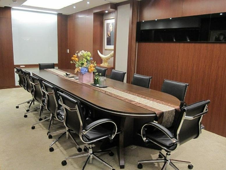Boardroom at 1 Exchange Square, 89 Songren Road, Xinyi District, Taipei, Taiwan with a long wooden table.