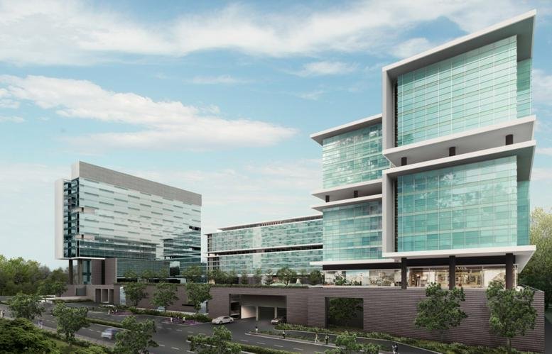 Exterior view of the glass-facade building at Business Bay, Survey No 103.