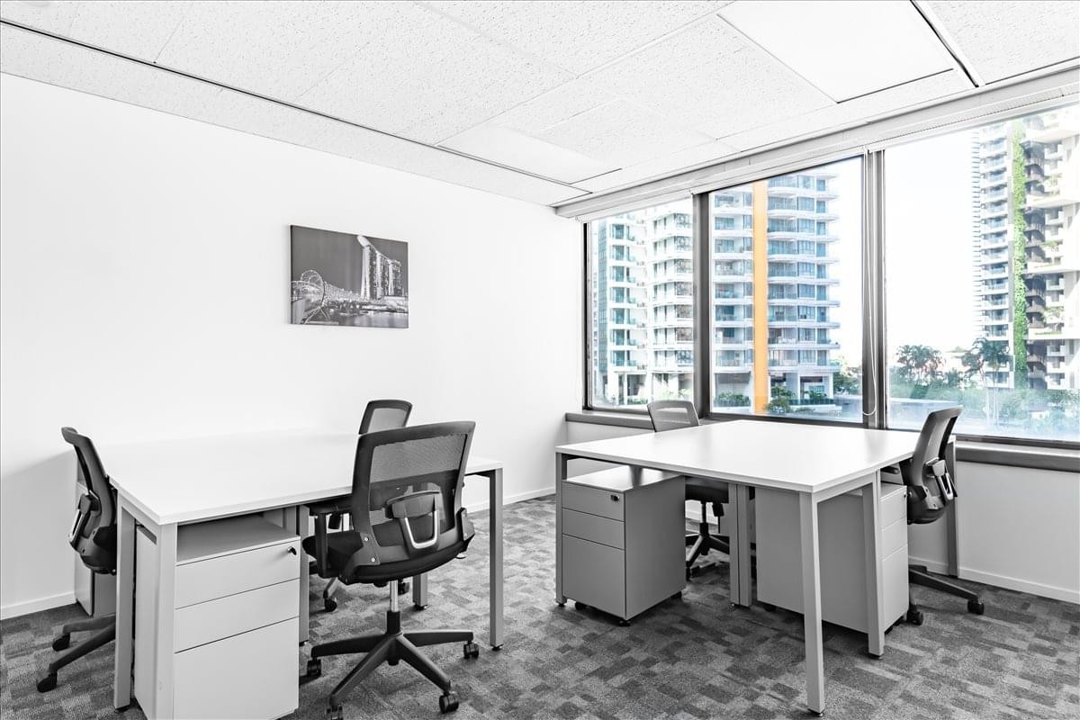 Bright private office suite at 101 Thomson Road, United Square with city views and multiple workstations.