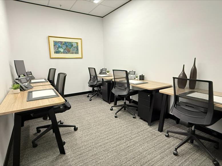 Brightly lit six-person office suite at the Reserve Bank Building, Level 6, 111 Macquarie Street.