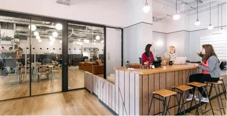 Spacious reception area at 1155 Fangdian Road, Pudong Shanghai with a wood-paneled counter and glass partitions.