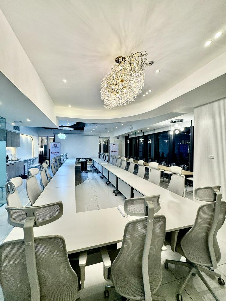 Spacious boardroom at Park Triangle Corporate Plaza, 11th Avenue, BGC, Taguig City with a crystal chandelier.