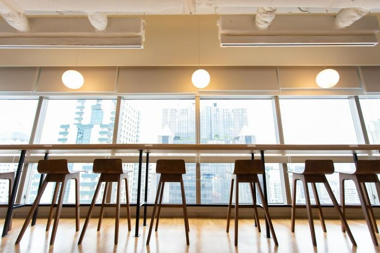Window-facing bar seating area for working with a view.