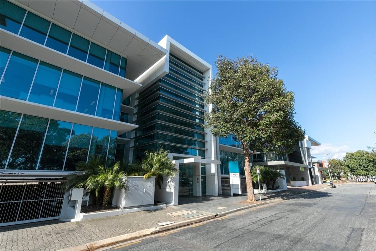 Exterior view of the glass-facade office building at 169 Fullarton Road, Dulwich.