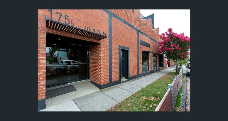 Exterior red brick facade of the office building at 175B Stephen Street.