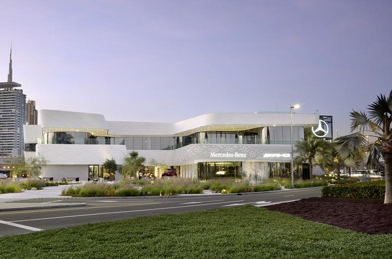 Wide exterior view of the modern white building at 1G D3 Street, Dubai Design District.