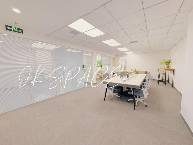 Spacious open-plan workspace at 2 Zong Fu Lu, City Centre, Chengdu, China with long desks and modern chairs.
