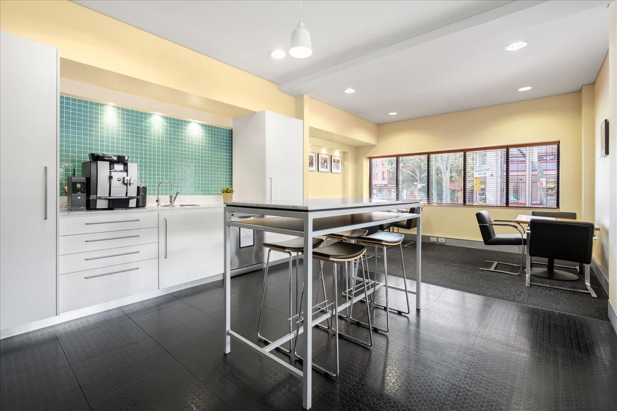 Spacious communal kitchen and breakout area at 246 Pacific Highway, Crows Nest.