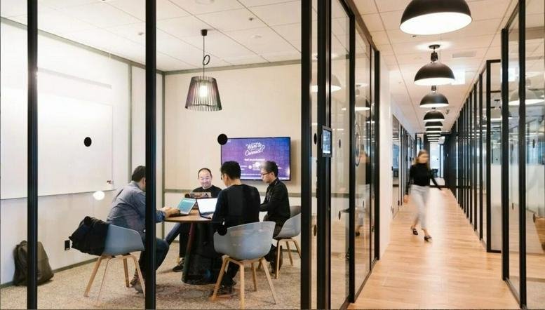 Modern meeting room at 292 Yan'an Lu, Shangcheng, Hangzhou Zhejiang with glass walls and professional lighting.