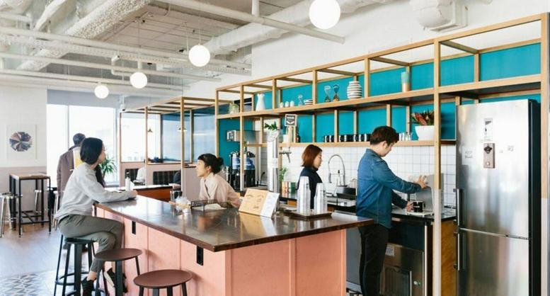 Modern communal kitchen and cafe area at 3 Chome−7−1 Yokohama-shi, Nishi Ward, Minatomirai.