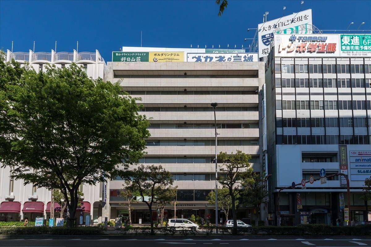 Exterior view of the multi-story Daiichi Central Building with surrounding city greenery.