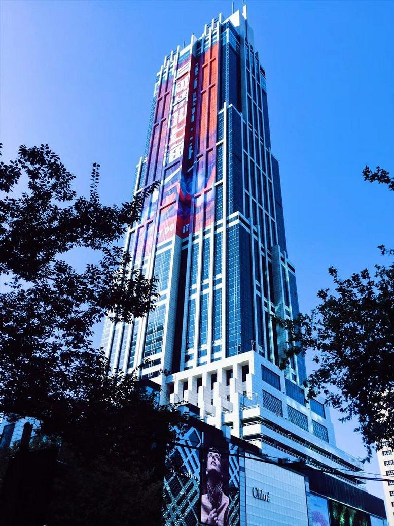 Exterior view of the modern office tower on Huaihai Zhong Road.