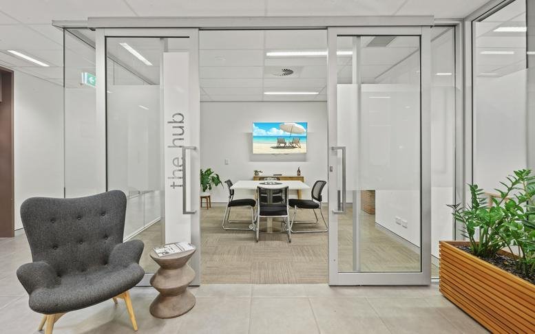 Spacious reception area at 307 Queen Street, Brisbane, Queensland with a sleek desk and accent wall.