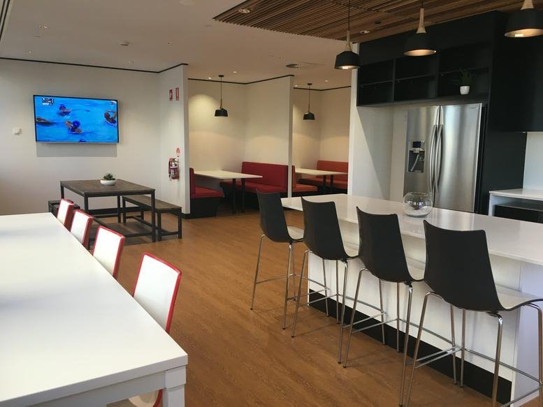 Spacious communal breakout area and kitchen at Level 18, 324 Queen Street, Golden Triangle.