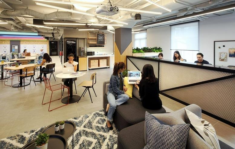 Spacious, modern coworking lounge at 40A Orchard Road, No. 03-01 with natural light and varied seating areas.