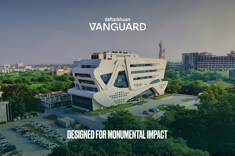 Exterior view of the modern, sculptural building at Daftarkhwan | Vanguard with unique white geometric facade.