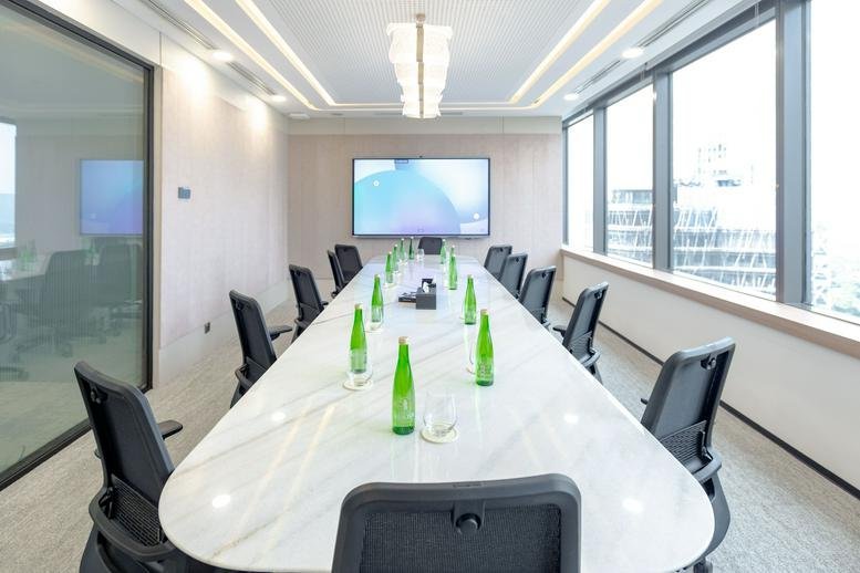 Meeting room at Halo Space, Jalan Jendral Sudirman Kav 52-53, SCBD with marble table and city views.