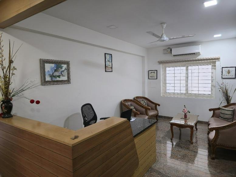 Bright reception and lounge area at 60, Venugopal Layout, Papanaickenpalayam.