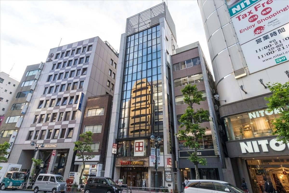 Exterior view of the Shibuya Miyata Building, a multi-story modern structure in Tokyo.