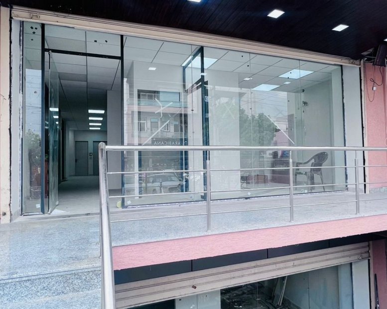 Exterior view of the glass-fronted entrance to Arvian Coworking, 70/45 Karma Patel Marg, Mansarovar, Jaipur.
