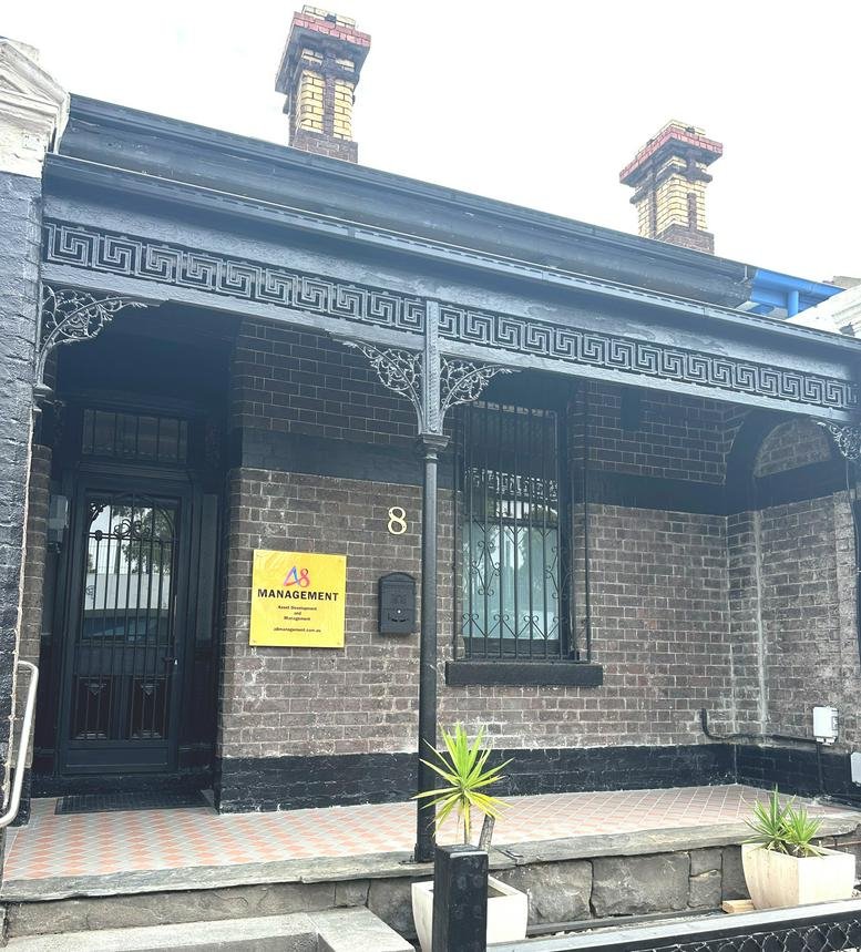 Victorian-style exterior of the office building at 8 Chatham Street, Prahran with ornate black ironwork.