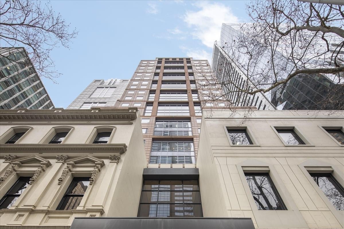 Exterior view of the classic and modern architectural facade at 90 Collins Street.